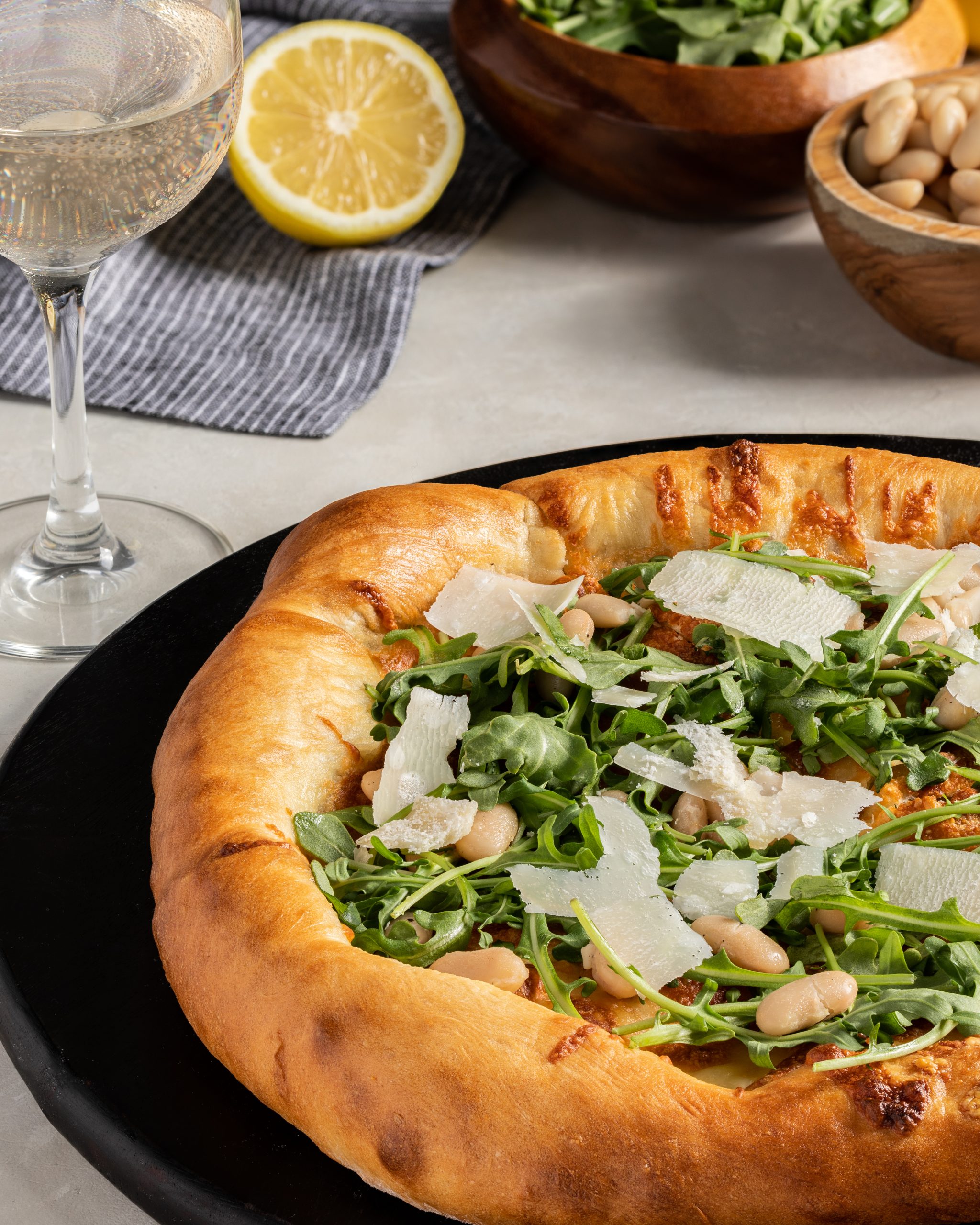 Salad Pizza with White Beans and Parmesan